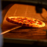 The Secret Behind Great Pizza: Tradition Meets Fire and Soul